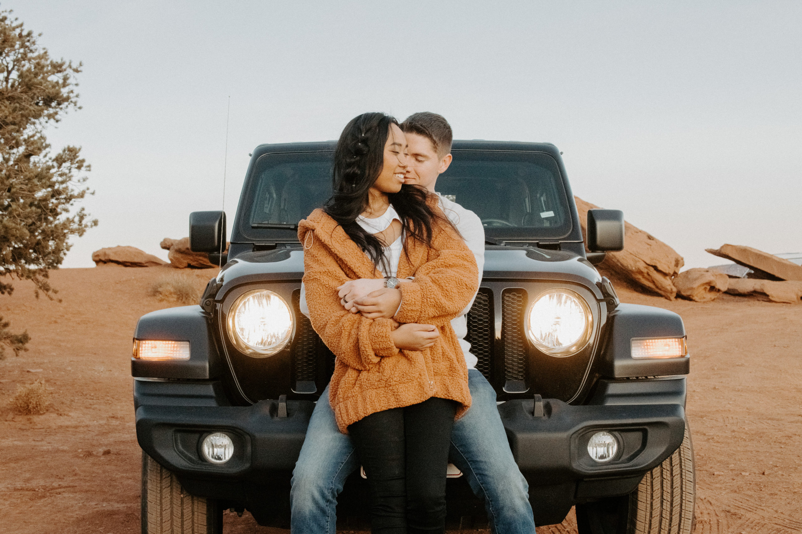 couple in front of jeep